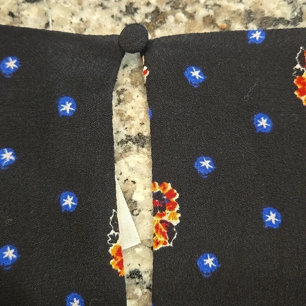 FREE PEOPLE TWO FACES SMOCKED BOHO FLORAL MINI DRESS. SIZE X-SMALL. NWOT